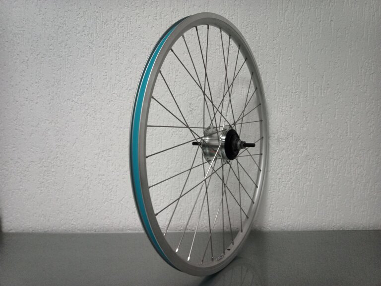 Rear wheel / 622X19C / Rigida - Ryde / Andra 10 / Silver / Shimano / Nexus Inter 7 SG-C3001-7R / 7S / 127 MM / Rollerbrake or Rim brake / City