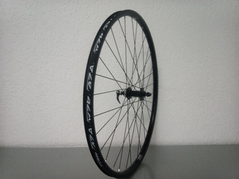 Roue avant / 622X21C / Rigida - Ryde / Andra 321 / Noir / Shimano / HB-TX505 Tourney / / 100 MM / Disc (Centerlock) / VTT - Tour