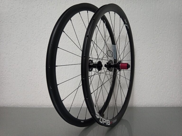 Wielset / 622X18C / Rigida - Ryde / DP18 Speed Disc / Zwart / Novatec / D792SB/A-AA-11S / HG Body 36,85 MM / 142 MM / Disc (6 bout) / Race