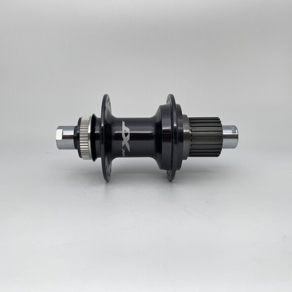 Rear hub / 142 MM / Thru axle Ø 12 MM / Disc (Centerlock) / 32GTS / Shimano / FH-M8110 Deore XT / Micro Spline / Black / MTB - Tour 