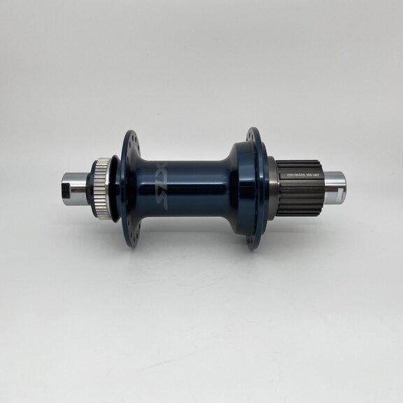 Rear hub / 157 MM / Thru axle Ø 12 MM / Disc (Centerlock) / 32GTS / Shimano / FH-M7130-B SLX / Micro Spline / Blue / MTB - Tour 