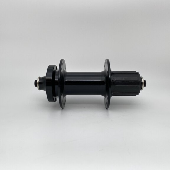 Rear hub / 141 MM / Drop axle / Disc (6 bolts) / 32GTS / Import / UNI / HG Body 35 MM / Black / Trek X-Caliber 