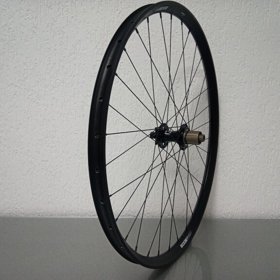 Roue arrière / 622X30C / Rigida - Ryde / Edge M 30 os / Noir / Novatec / D462SB-A5A-B12 / HG Body 36,85 MM / 148 MM / Disque (6 boulons) / VTT 