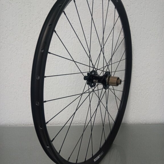 Roue arrière / 622X30C / Rigida - Ryde / Edge M 30 os / Noir / Novatec / D462SB-A5A-B12 / HG Body 35 MM / 148 MM / Disque (6 boulons) / VTT 