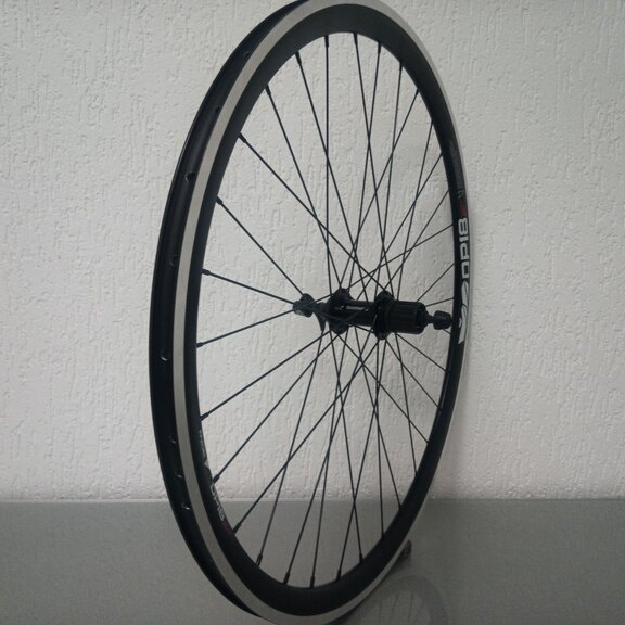 Achterwiel / 622X18C / Rigida - Ryde / DP18 Speed / Zwart / Shimano / FH-RS400 Tiagra / HG Body 36,85 MM  / 130 MM / Velgrem / Race 