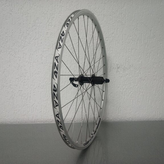 Roue arrière / 559X19C / Rigida - Ryde / ZAC Pro / Silver / Shimano / FH-T4000 Alivio / HG Body 35 MM / 135 MM / Frein sur jante / VTT - Tour 