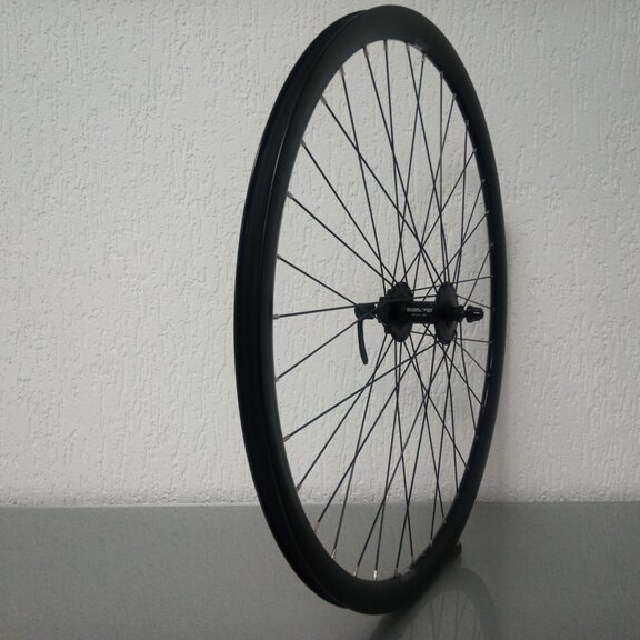 Roue avant / 622X19C / Rigida - Ryde / Dutch 19 / Noir / Shimano / HB-M475 Deore / / 100 MM / Disque (6 boulons) / Tour 