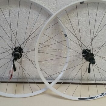 Paire de roues / 584X21C / Rigida - Ryde / Edge 7 / Blanc / Shimano / FH-RM66 & HB-RM65 / HG Body 35 MM / 135 MM / Disc (Centerlock) / VTT - Tour